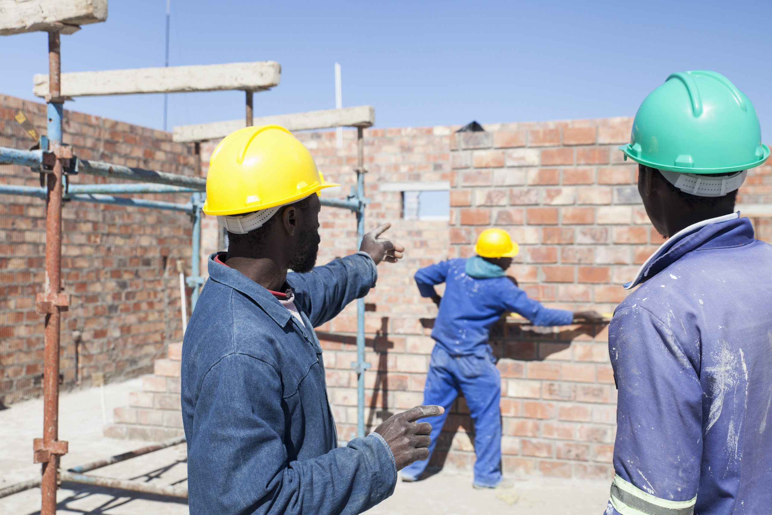 Builders working on construction site
